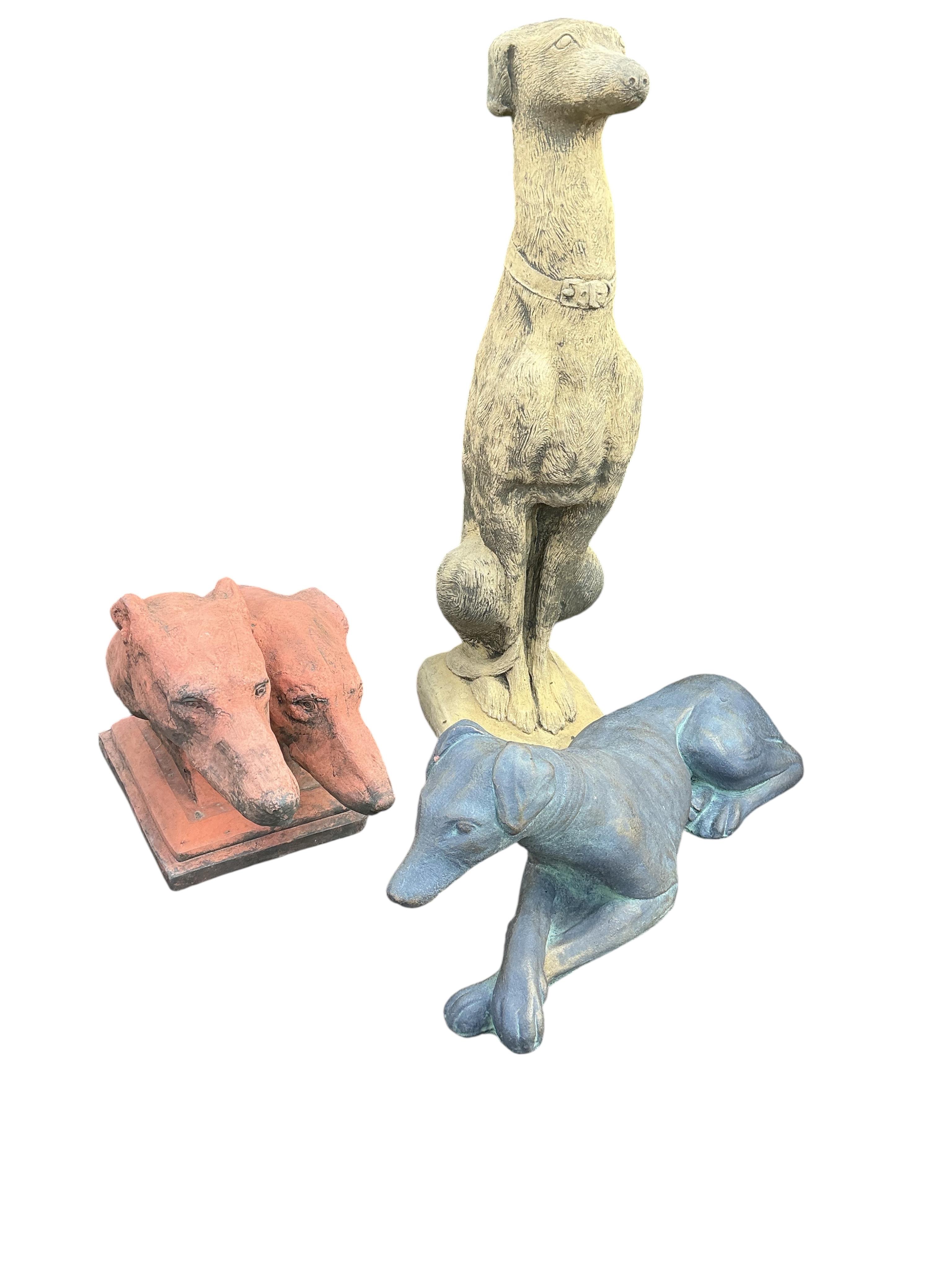 Three cast stone greyhound ornaments, largest height 74cm